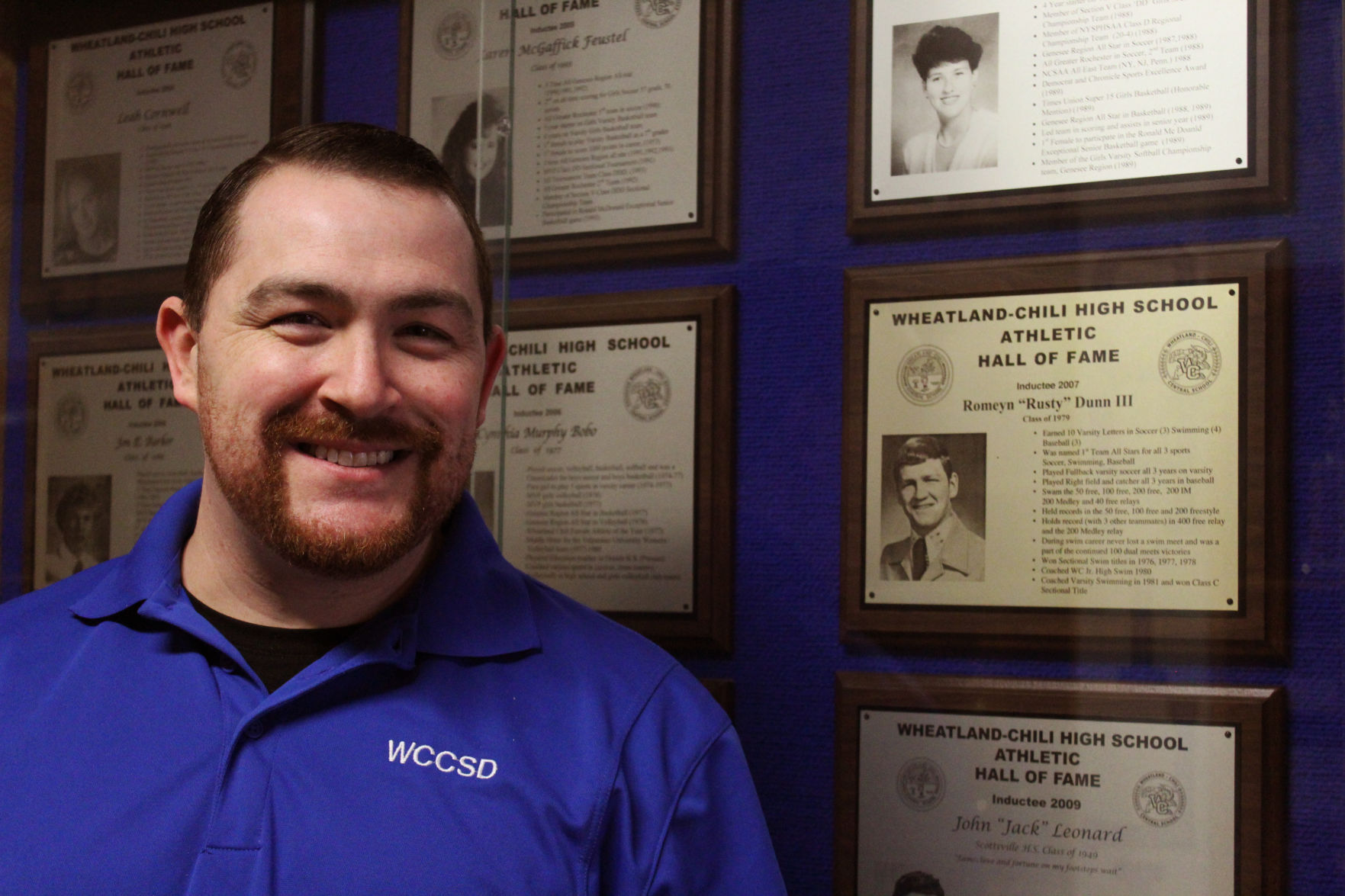 Coach Dunn with his father’s Hall of Fame plaque